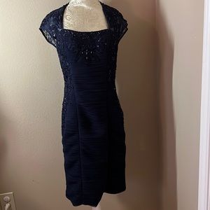 Navy Blue beaded cocktail dress for all occasions. Beautiful neck, see thru back